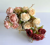 Bouquet of pink, white, and red roses on a white background with 'Gardenia' branding.
