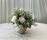 Custom-made silk floral arrangement for signable table at ceremony