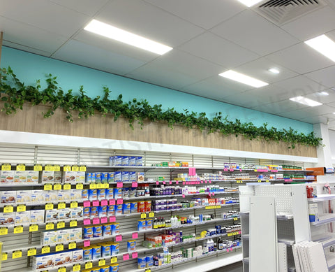 Optimal Pharmacy (Midland WA) - Hanging Artificial Greenery for Built-in Selves | ARTISTIC GREENERY